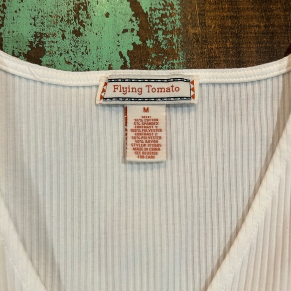 White ruffled body suit. Worn once. Size m - Picture 2 of 2